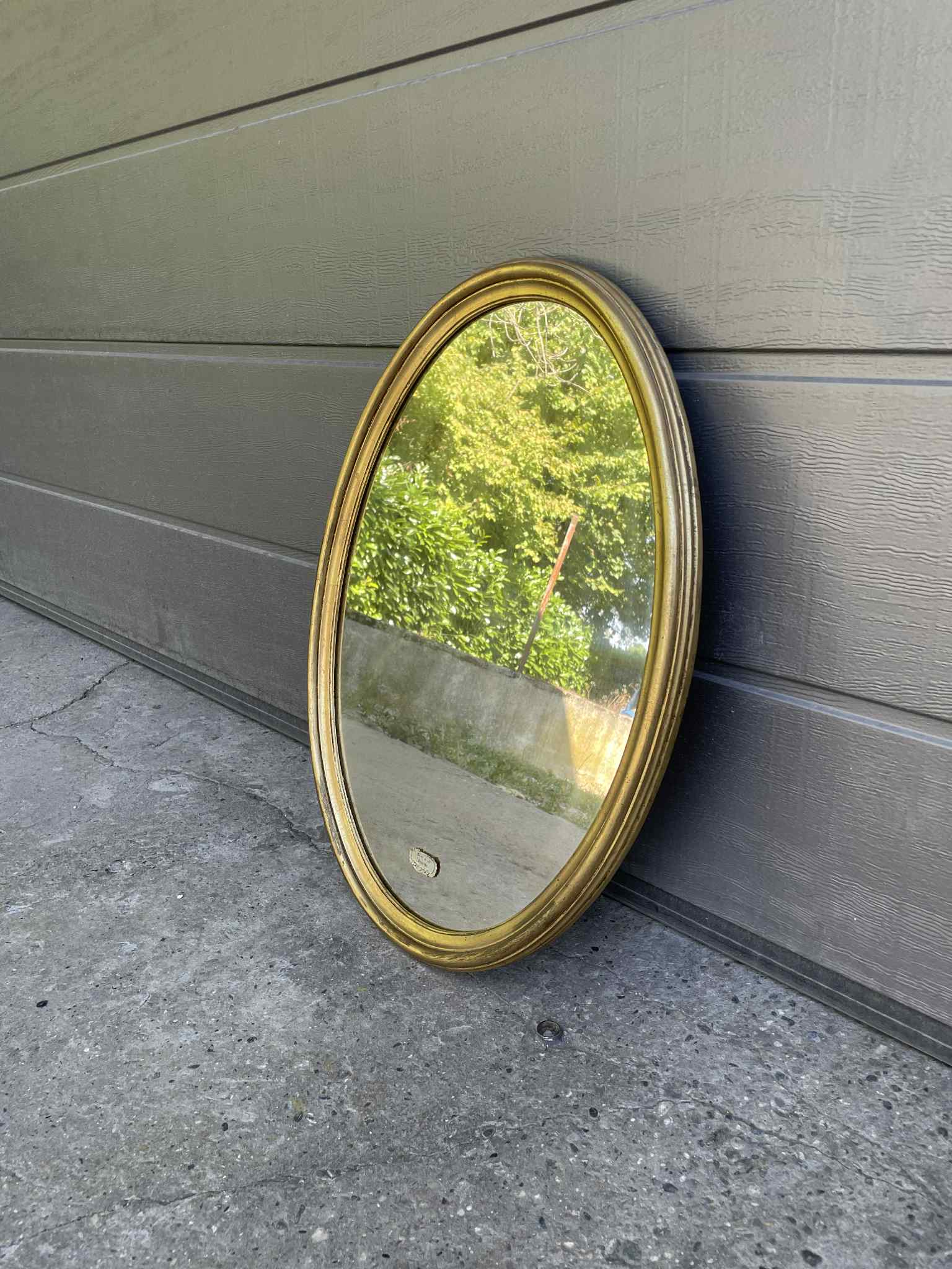 Miroir ovale doré