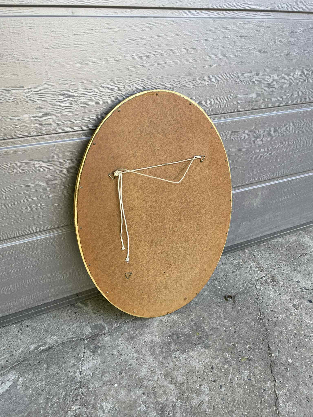Miroir ovale doré