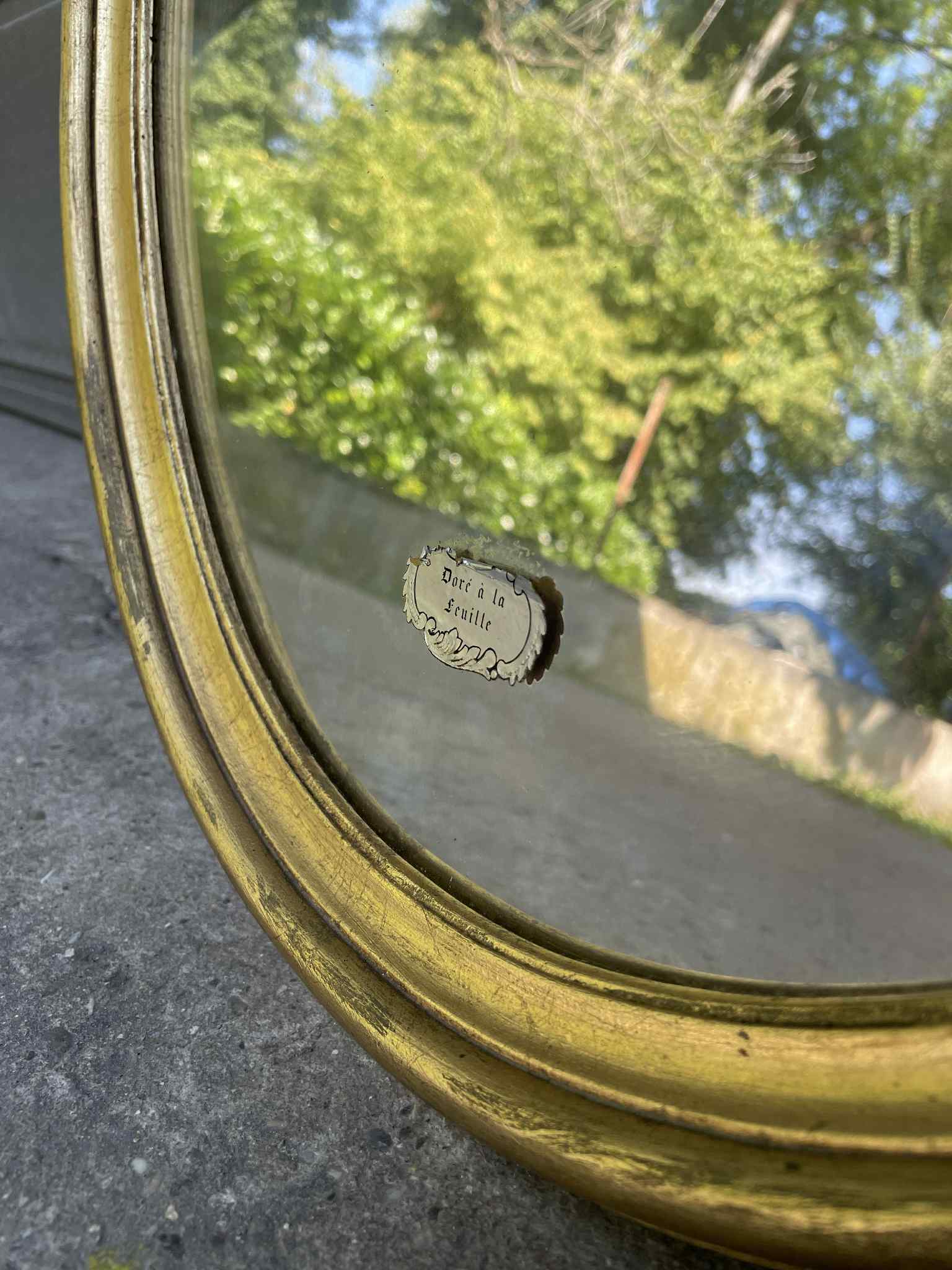 Miroir ovale doré