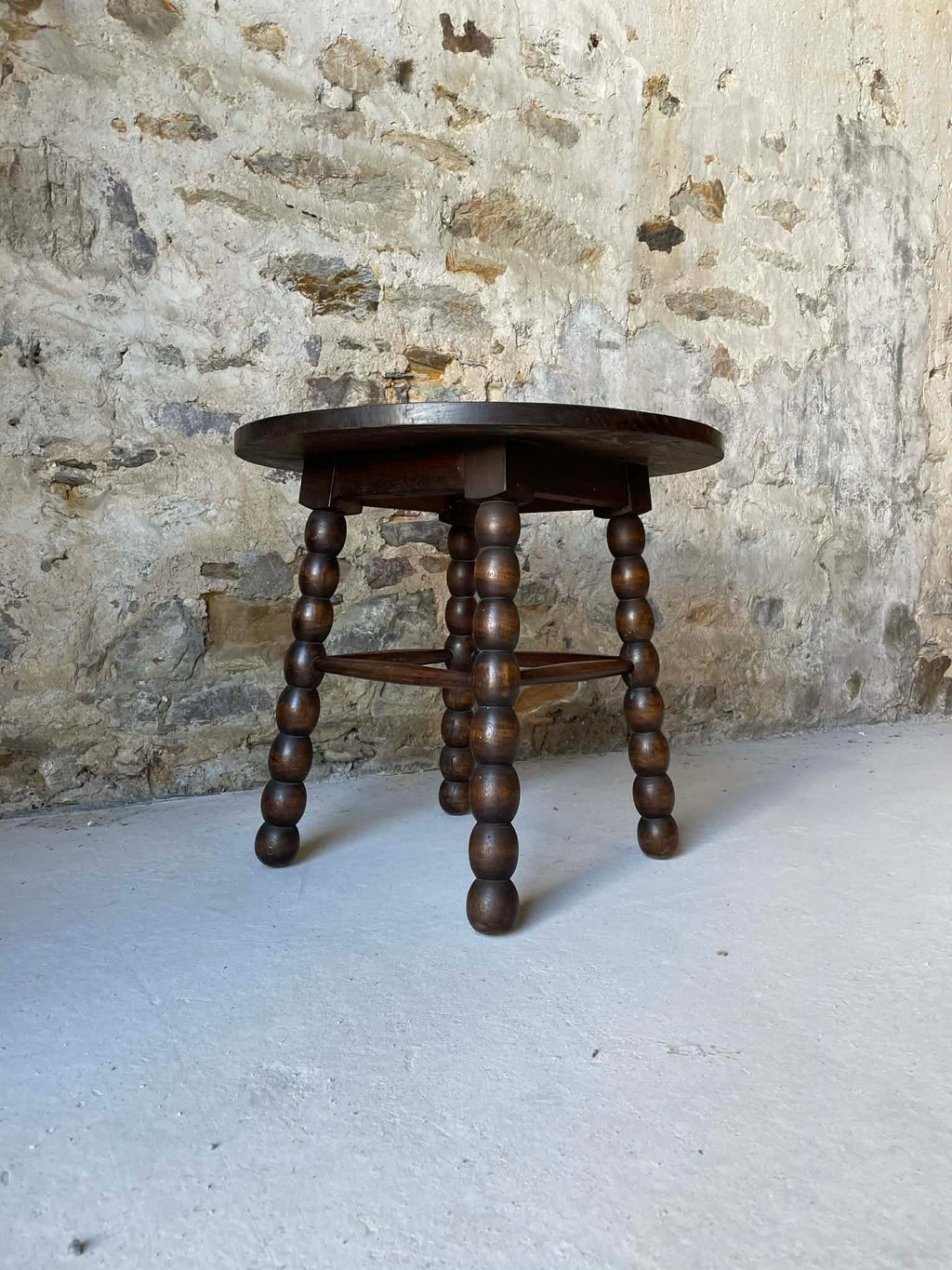Table basse ronde en bois pieds tournés