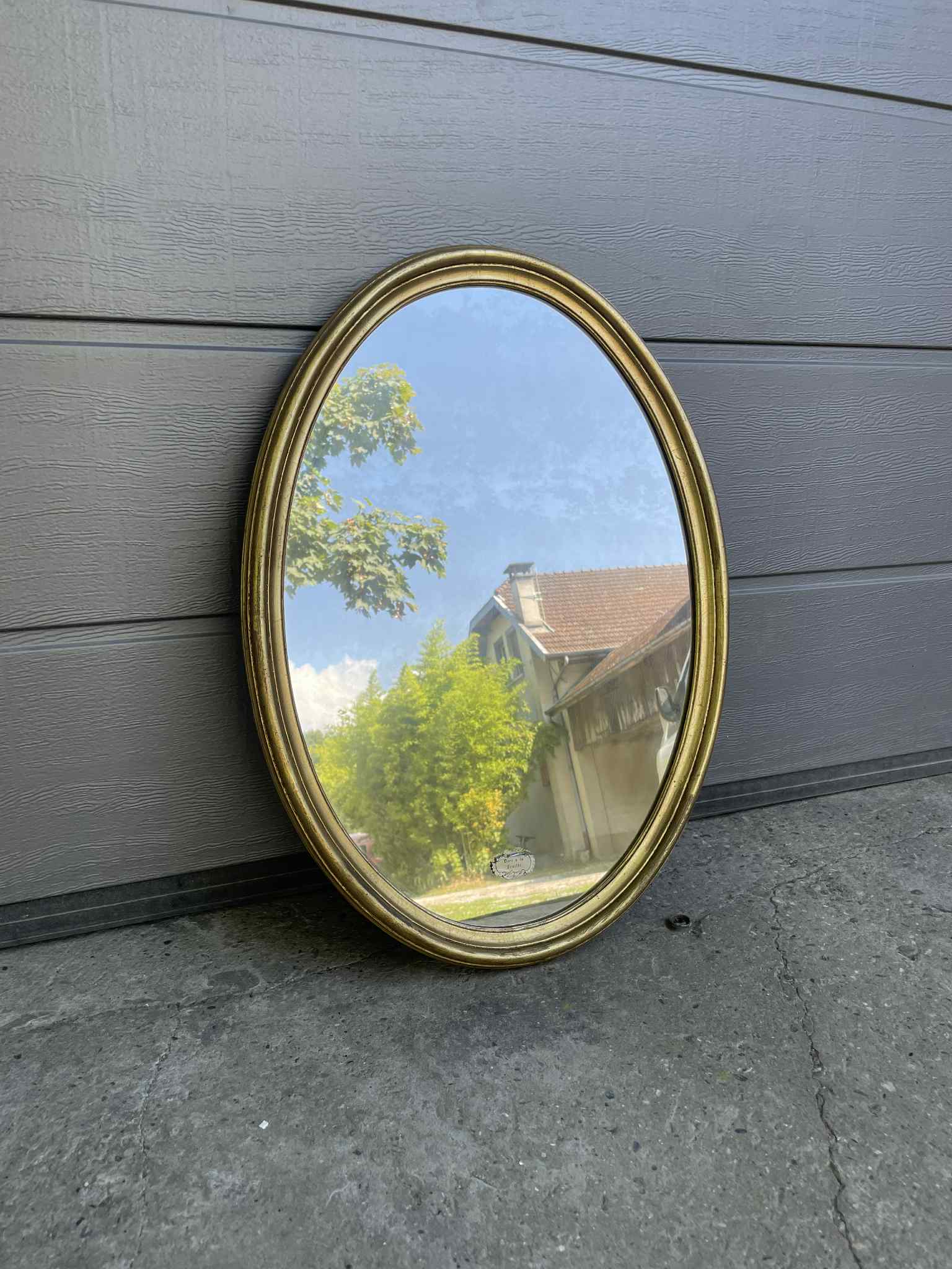 Miroir ovale doré
